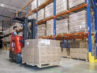 A forklift operator moves palletized inventory within Vantive’s distribution facility in Vancouver, B.C.